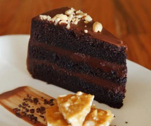 Chocolate Peanut Butter Cake with peanut brittle and cocoa nibs